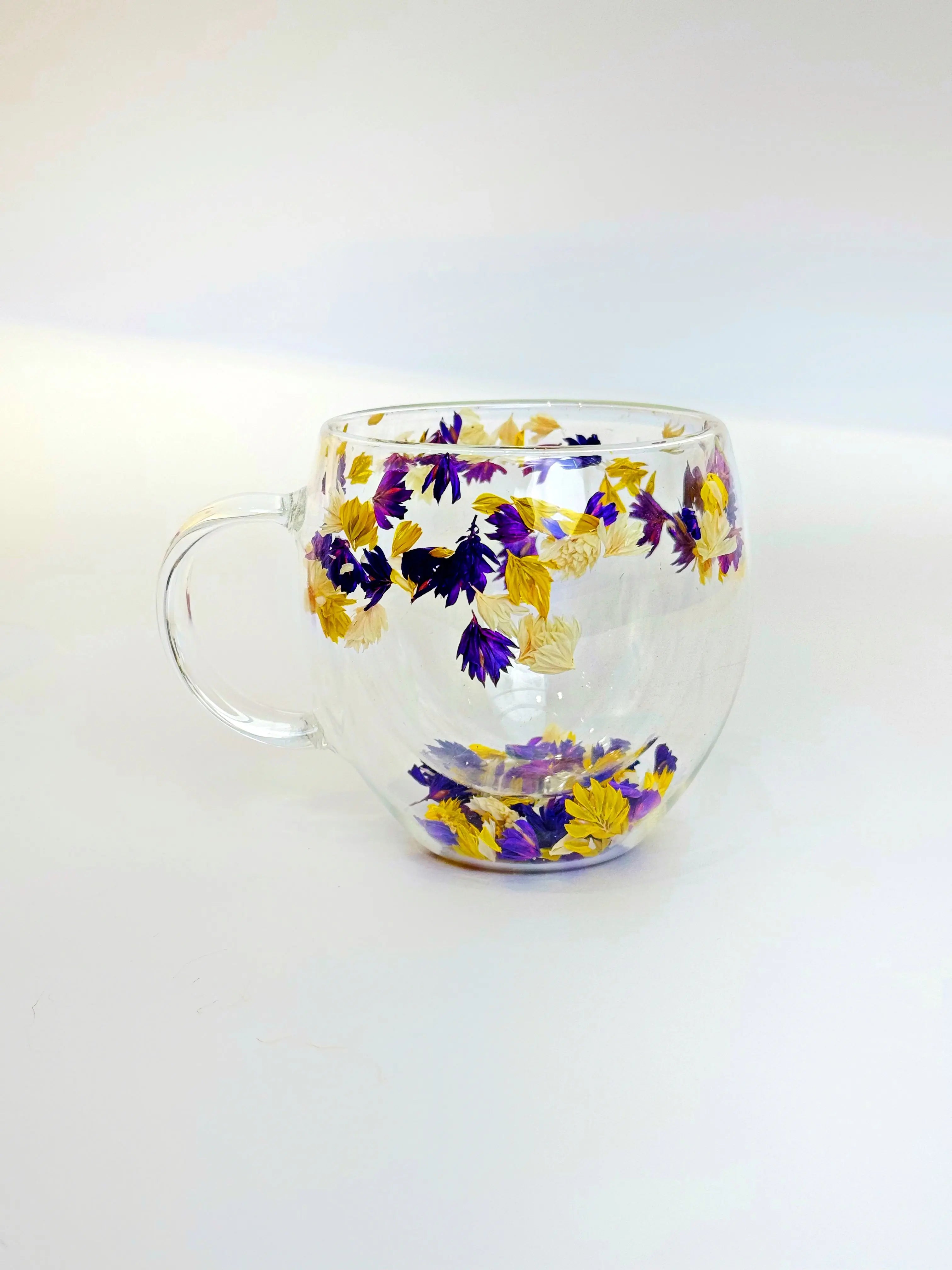 Order Handmade Glass - Purple Bloom Mug for LE 320.00 at Coffee & Cream, All your coffee needs in one place. Shop Coffee, Beans, Ground Coffee, Instant Coffee, Creamers, Coffee Machines, Blenders, and more. 50+ Brands Monin, Lavazza, Starbucks, Nespresso,