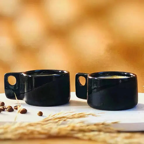Order Handmade Pottery - Black Espresso Cup - 100 ml (Set of 2) for LE 430.00 at Coffee & Cream, All your coffee needs in one place. Shop Coffee, Beans, Ground Coffee, Instant Coffee, Creamers, Coffee Machines, Blenders, and more. 50+ Brands Monin, Lavazz
