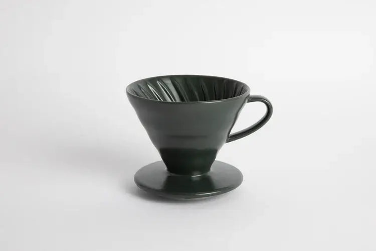 Order V60 porcelain Coffee Dripper 02 - black for LE 550.00 at Coffee & Cream, All your coffee needs in one place. Shop Coffee, Beans, Ground Coffee, Instant Coffee, Creamers, Coffee Machines, Blenders, and more. 50+ Brands Monin, Lavazza, Starbucks, Nesp