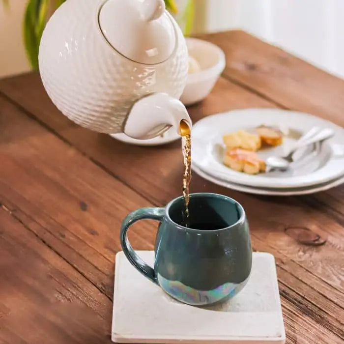 Order Handmade Pottery Coffee Mug - Emerald Color for LE 445.00 at Coffee & Cream, All your coffee needs in one place. Shop Coffee, Beans, Ground Coffee, Instant Coffee, Creamers, Coffee Machines, Blenders, and more. 50+ Brands Monin, Lavazza, Starbucks,