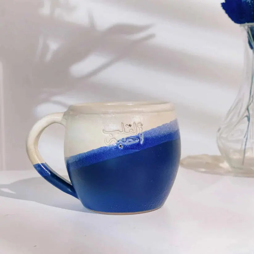 Order Handmade Pottery Coffee Mug - For a Heart I Love Blue & White for LE 445.00 at Coffee & Cream, All your coffee needs in one place. Shop Coffee, Beans, Ground Coffee, Instant Coffee, Creamers, Coffee Machines, Blenders, and more. 50+ Brands Monin, La