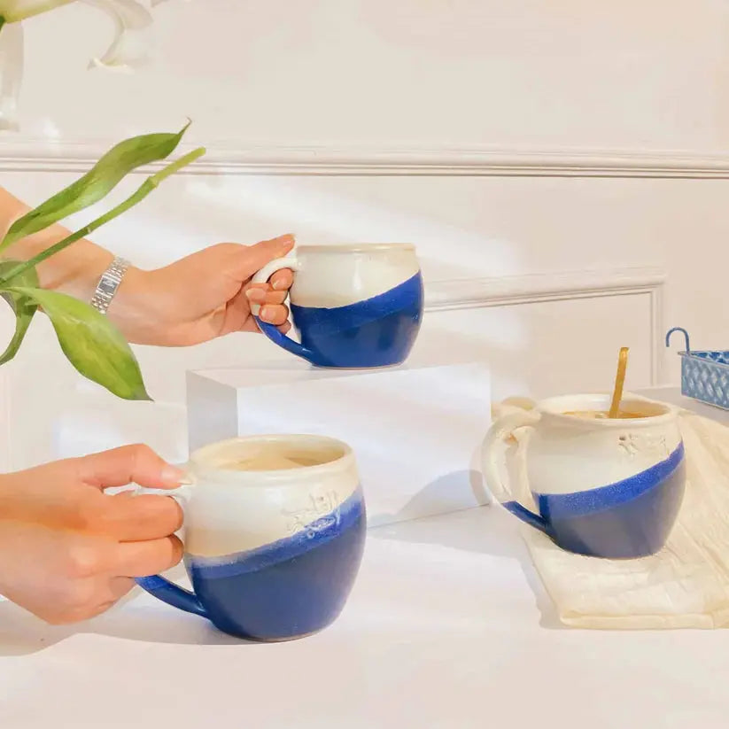 Order Handmade Pottery Coffee Mug - Saada Blue & White for LE 445.00 at Coffee & Cream, All your coffee needs in one place. Shop Coffee, Beans, Ground Coffee, Instant Coffee, Creamers, Coffee Machines, Blenders, and more. 50+ Brands Monin, Lavazza, Starbu