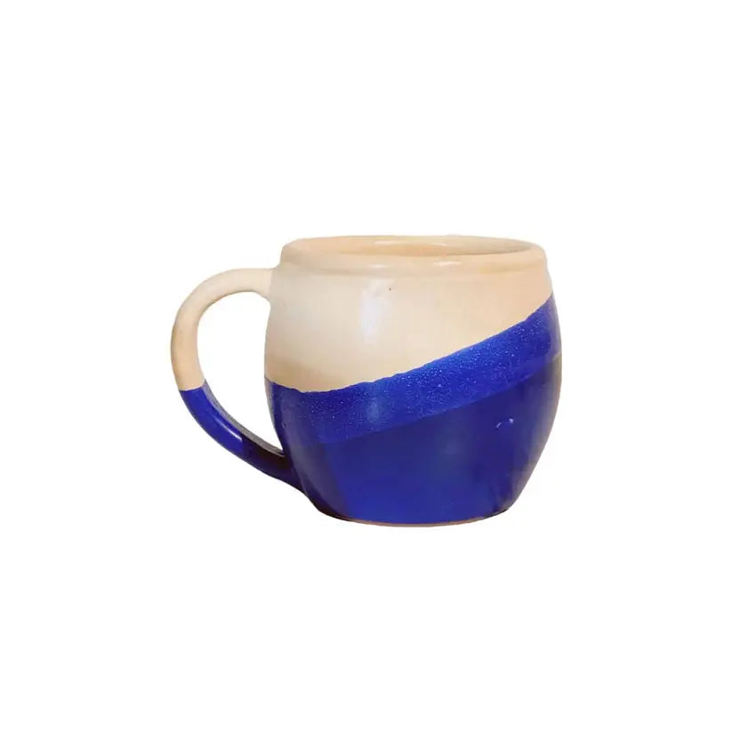 Order Handmade Pottery Coffee Mug - Wavy Blue & White for LE 445.00 at Coffee & Cream, All your coffee needs in one place. Shop Coffee, Beans, Ground Coffee, Instant Coffee, Creamers, Coffee Machines, Blenders, and more. 50+ Brands Monin, Lavazza, Starbuc