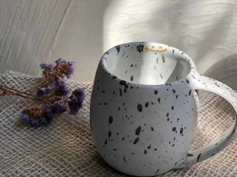 Order Handmade Pottery Coffee Mug - White & Black Dots for LE 445.00 at Coffee & Cream, All your coffee needs in one place. Shop Coffee, Beans, Ground Coffee, Instant Coffee, Creamers, Coffee Machines, Blenders, and more. 50+ Brands Monin, Lavazza, Starbu