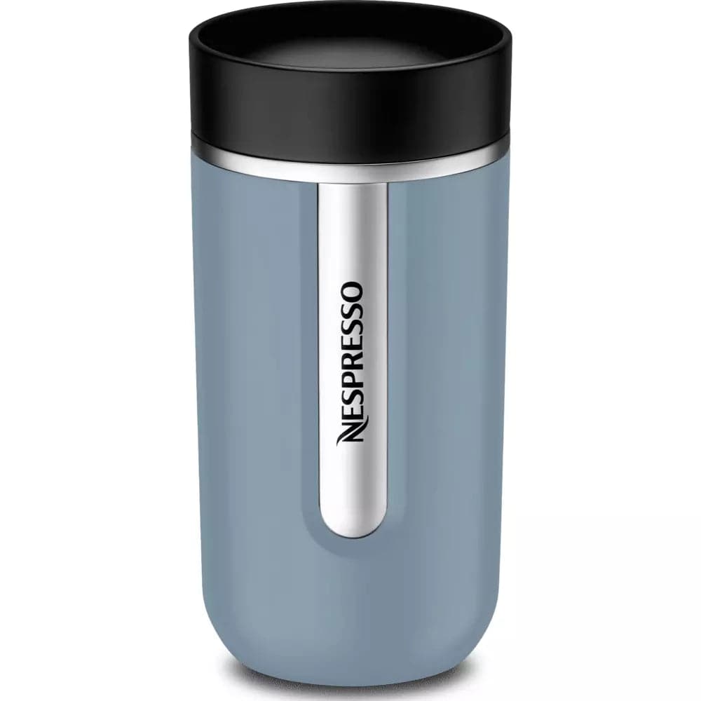Order Nespresso -Nomad Travel Mug Ocean Blue - Medium for LE 850 at Coffee & Cream, All your coffee needs in one place. Shop Coffee, Beans, Ground Coffee, Instant Coffee, Creamers, Coffee Machines, Blenders, and more. 50+ Brands Monin, Lavazza, Starbucks, Nespresso, Arzum, and more. Become your own Baristaeg at home. Delivers All over Egypt. Online payments available, and get your fengany coffee delivered to your home. Product Description: The NOMAD travel mugs are made to go around town.It can hold hot or